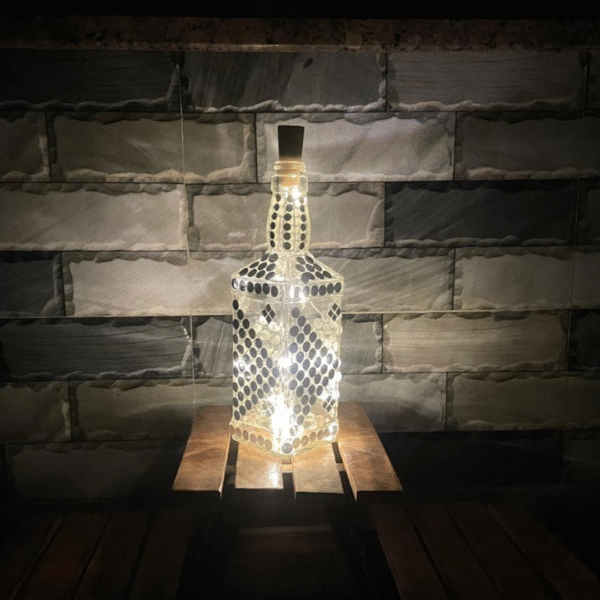 Illuminate Your Space: Bottle Art with Mirror Stickers and Lights