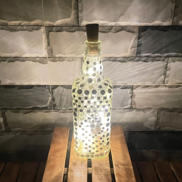 Illuminate Your Space: Bottle Art with Mirror Stickers and Lights